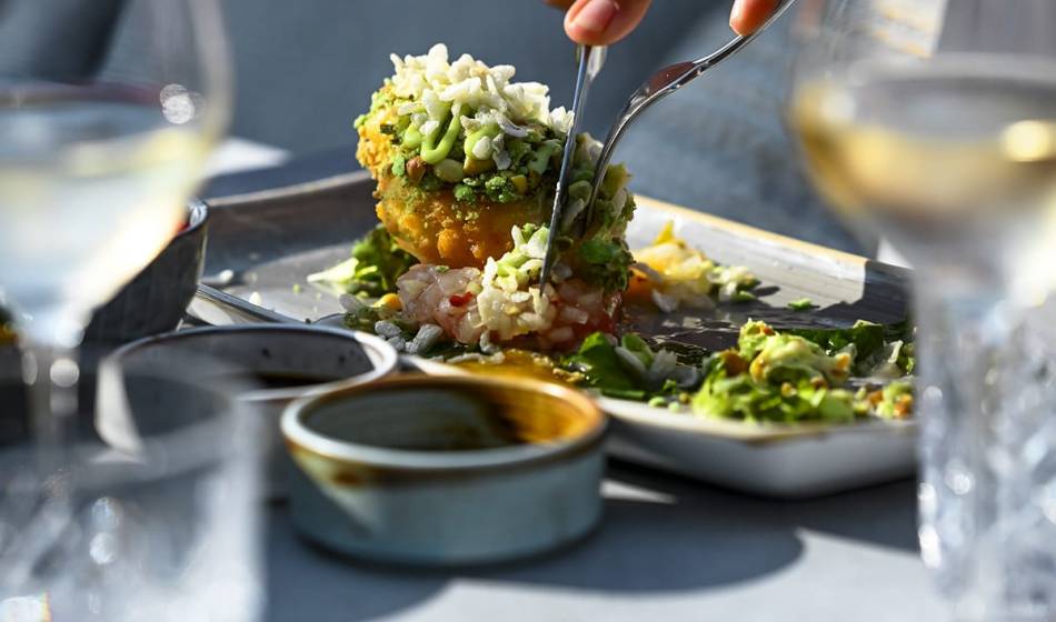 Shrimp with herbs and sauces on a plate, served with fresh ingredients, cut by one hand in #herrhoshi.